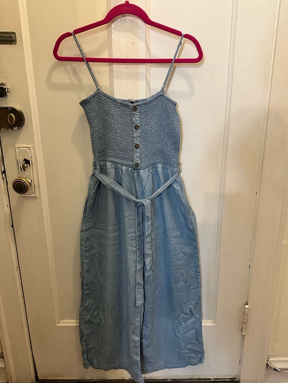 Light Wash Denim ankle length jumpsuit with Smocked Bodice
